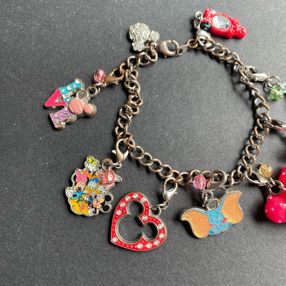 Disney charm bracelet with 7 charms plus the silver toned Mickey head - Picture 9 of 10